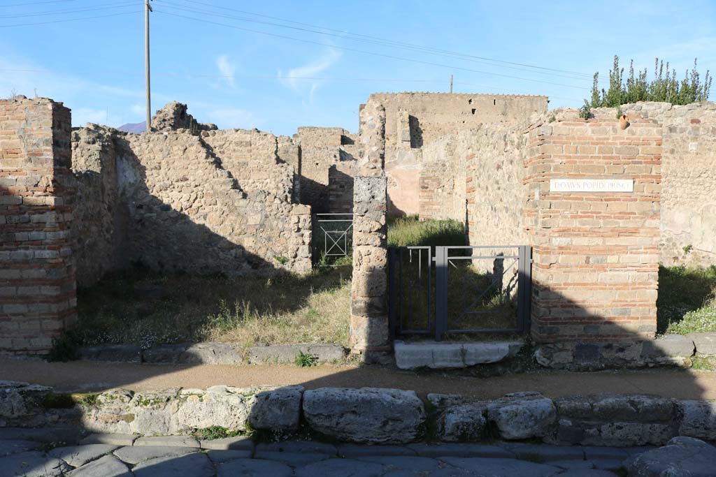 VII.2.35, Pompeii, in centre. December 2018. Looking north to entrances, with VII.2.34, on left. Photo courtesy of Aude Durand.