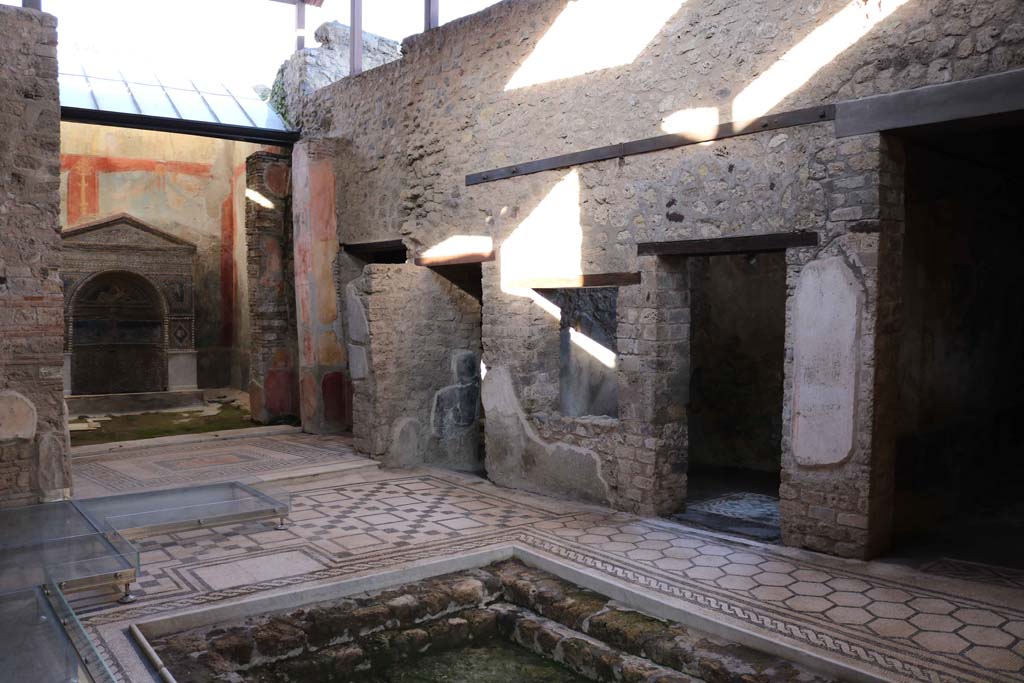 VII.2.45, Pompeii. December 2018. Looking towards doorways to rooms on east side of atrium.  Photo courtesy of Aude Durand.