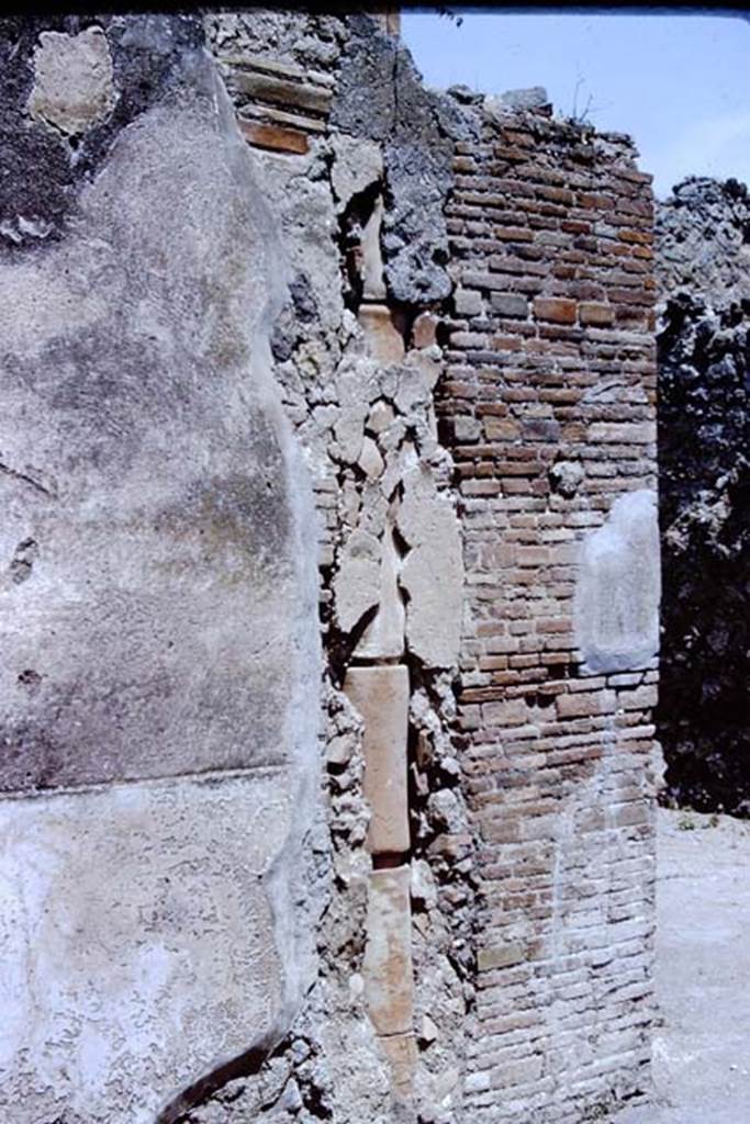 VII.2.52 Pompeii. 1966. Waste down pipe in exterior wall between VII.2.51and 52.
Photo by Stanley A. Jashemski.
Source: The Wilhelmina and Stanley A. Jashemski archive in the University of Maryland Library, Special Collections (See collection page) and made available under the Creative Commons Attribution-Non Commercial License v.4. See Licence and use details. J66f0477
