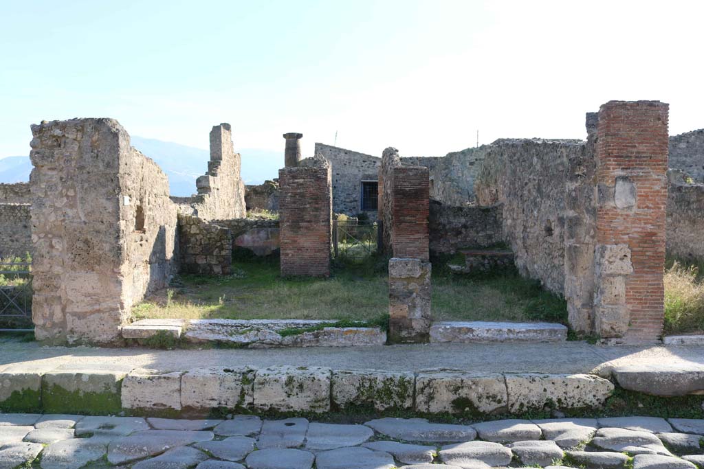 VII.3.12, on left and VII.3.11 Pompeii. December 2018. Looking south-west from Via della Fortuna. Photo courtesy of Aude Durand.

