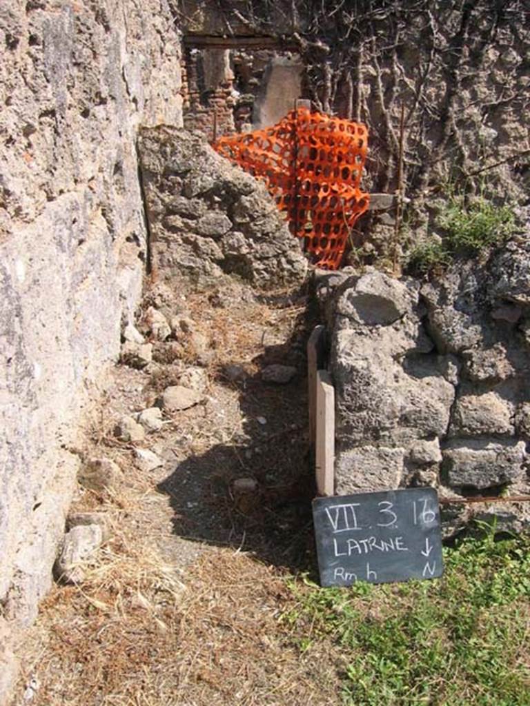VII.3.16 Pompeii. July 2008. Latrine in south-east corner of shop, near to entrance doorway, on left. Photo courtesy of Barry Hobson.