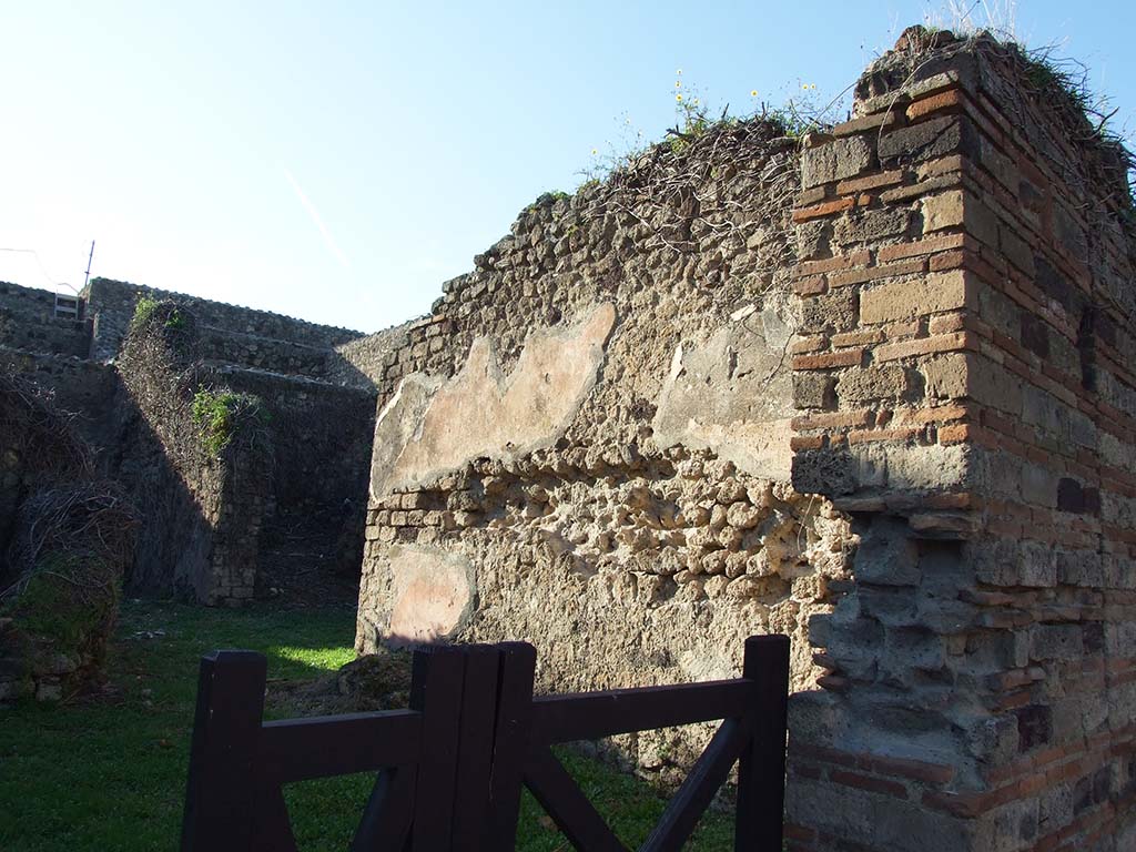 VII.3.23 Pompeii. December 2006. North wall of shop and doorway to small atrium.