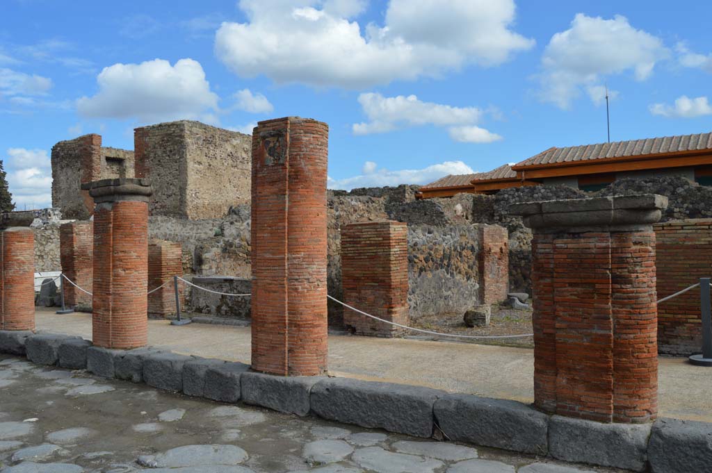 VII.4.6 Pompeii, on right of pilaster. December 2018. 
Looking east towards entrance doorway behind portico on Via del Foro. Photo courtesy of Aude Durand.
