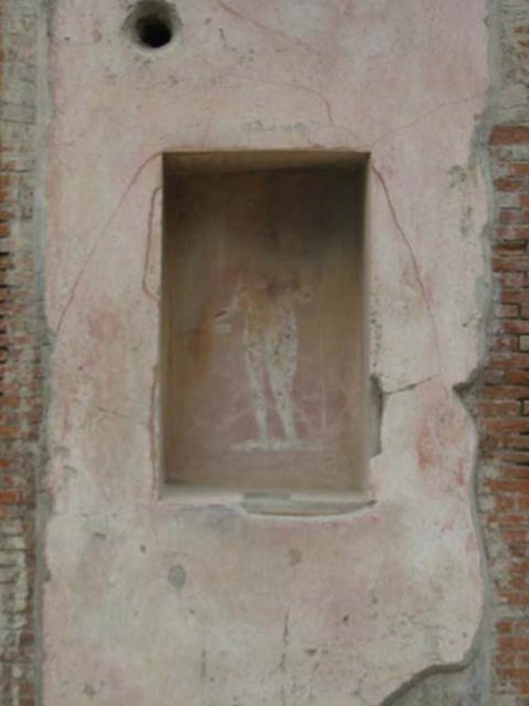 VII.4.17 Pompeii.  May 2003. Street shrine with a picture of Jupiter with thunderbolt and sceptre. Photo courtesy of Nicolas Monteix.

