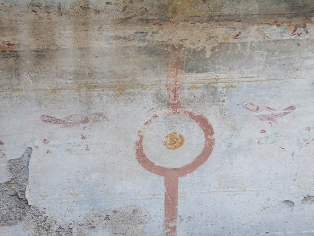 VII.4.31 Pompeii. March 2009. Room 21, detail of painted wall decoration on north wall of triclinium.