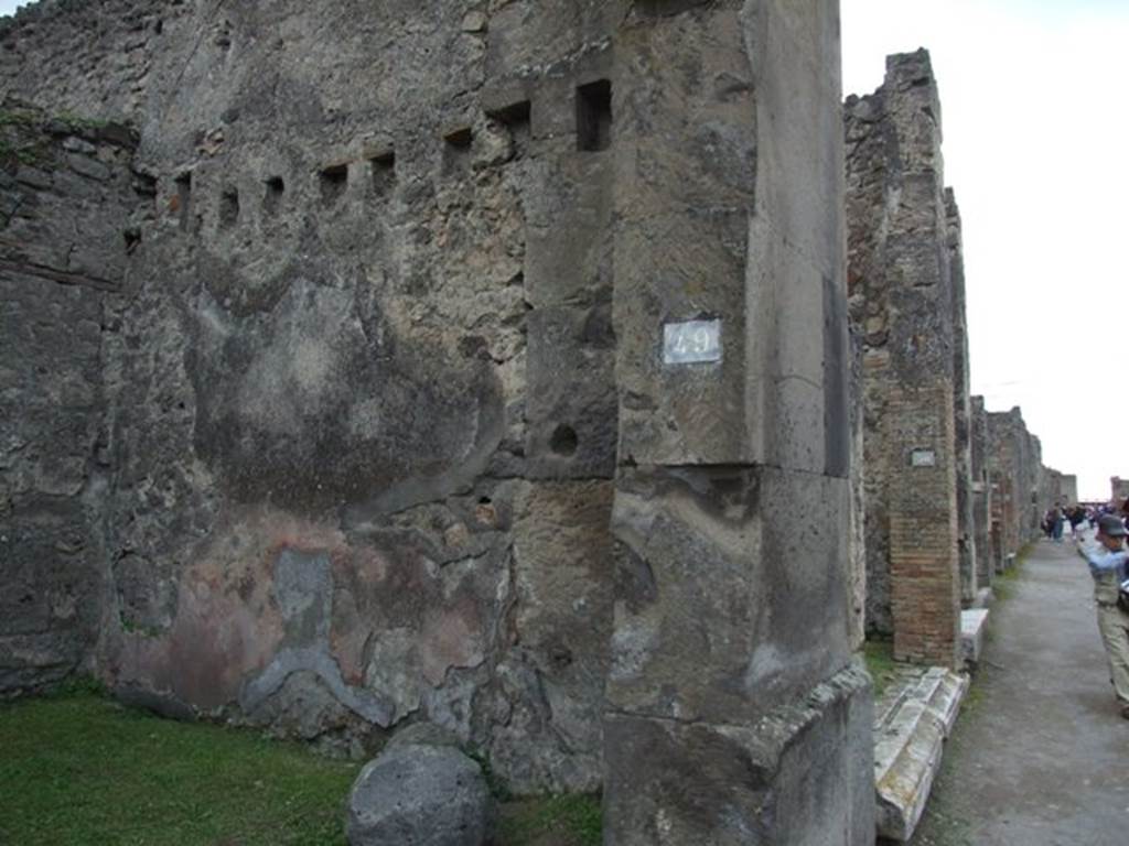 VII.4.49 Pompeii. March 2009. West wall, looking west along Via della Fortuna.
Graffito found painted on the pilaster between VII.4.49 and 50 –

[…]  Aqutium  […]
d(uum)v(irum)  v(irum)  [b(onum) [...]       [CIL IV 2]
See Varone, A. and Stefani, G., 2009. Titulorum Pictorum Pompeianorum, Rome: L’erma di Bretschneider, (p. 357 & Tav. XXIXc)
See Epigraphik-Datenbank Clauss/Slaby (See www.manfredclauss.de)

Also found in June 1833, outside VII.4.49 was –

M(arcum)  Cerrinium     [CIL IV 288]

See Pagano, M. and Prisciandaro, R., 2006. Studio sulle provenienze degli oggetti rinvenuti negli scavi borbonici del regno di Napoli. Naples: Nicola Longobardi.  (p. 148)

