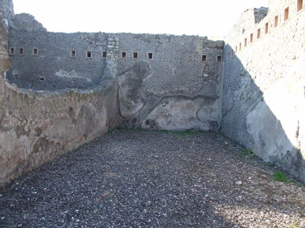 VII.5.22 Pompeii. December 2007. West wall at rear, with site of stairs to upper floor visible in the plasterwork.