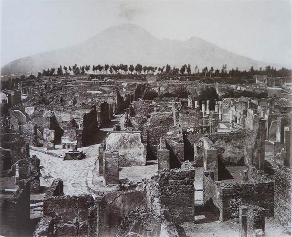 VII.6.11 Pompeii. Photo of abt.1870. Looking north across north side of insula VII.6. The entrance corridor of VII.6.11 can be seen on the right of the photo, leading into the atrium. The brick pilaster can again be seen in the lower right of the photo.


