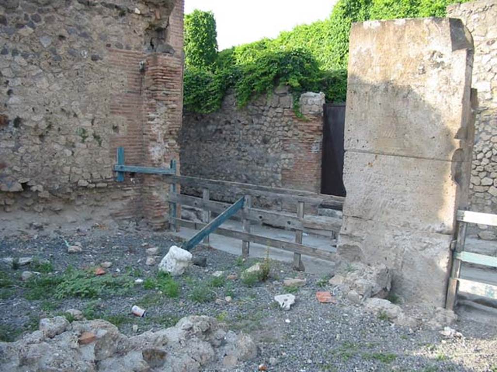 VII.6.19 Pompeii. May 2003. Looking east towards entrance doorway on Vicolo delle Terme,. Photo courtesy of Nicolas Monteix.