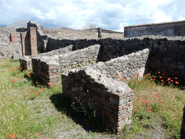 VII.7.2 Pompeii, May 2018. Looking east into one of the three rooms on east side of peristyle.
Photo courtesy of Buzz Ferebee.
