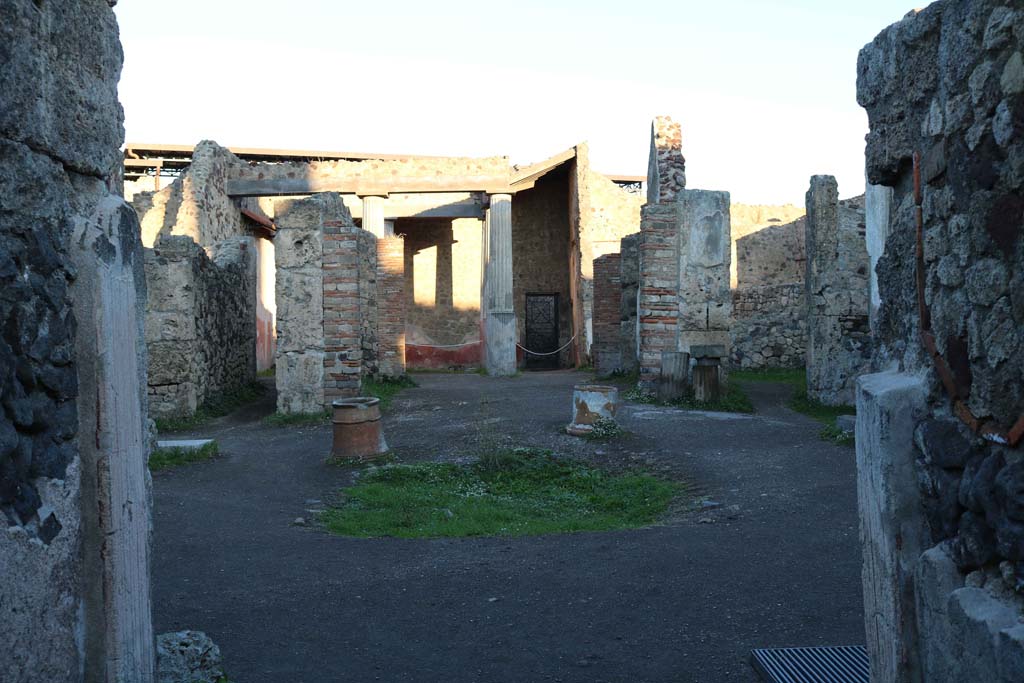 VII.7.10, Pompeii. December 2018. 
Looking north from entrance doorway across atrium, towards peristyle and rear doorway at VII.7.13. Photo courtesy of Aude Durand.
