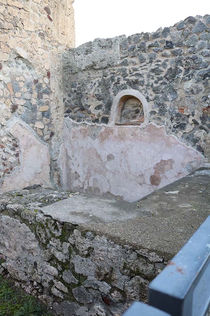 VII.7.11, Pompeii. December 2018. 
Looking across two-sided counter towards north-east corner. Photo courtesy of Aude Durand.
