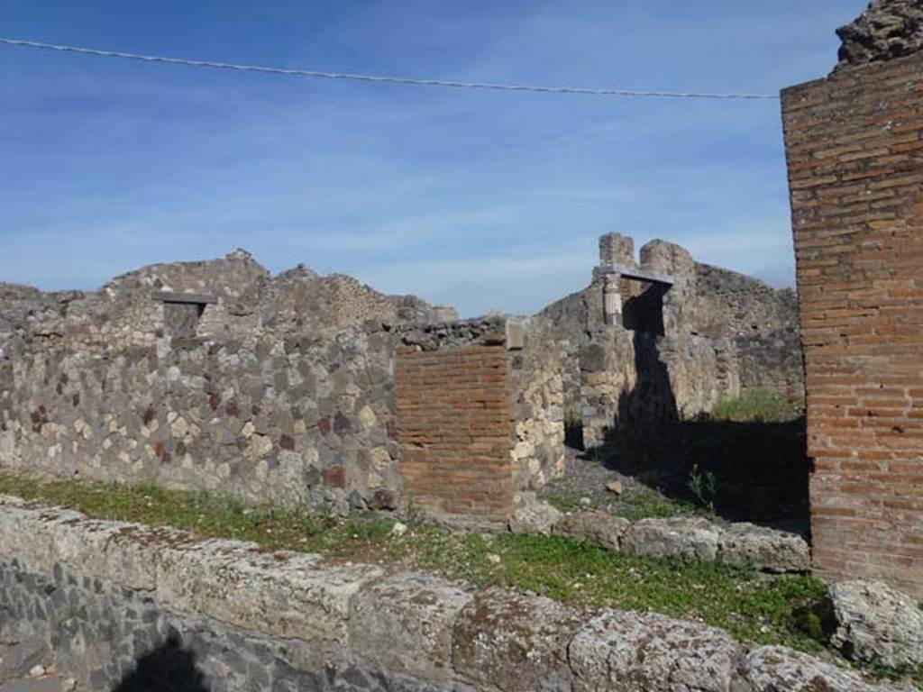 VII.7.19 Pompeii. June 2012. Looking south to entrance doorway on Vicolo dei Soprastanti.
