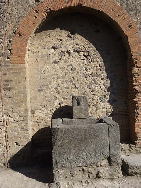 Fountain next to VII.7.26 outside north wall of VII.8, Pompeii. June 2012. Photo courtesy of Michael Binns.
