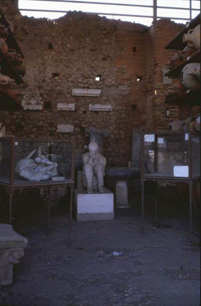 VII.7.29 Pompeii. May 2015. Plaster cast of body, together with other items in storage. 
Photo courtesy of Buzz Ferebee.
