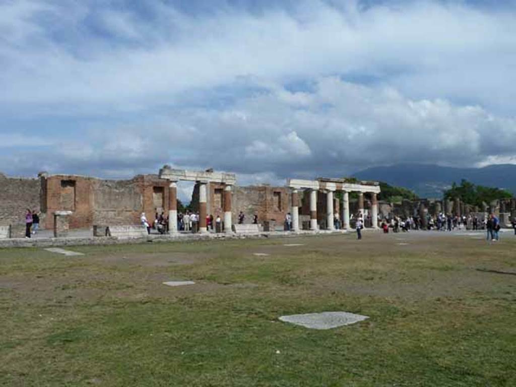 VII.8 Pompeii Forum. May 2010. Portico of Eumachia Building on east side.