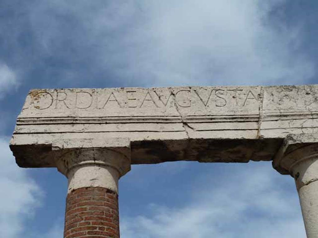 VII.8 Pompeii Forum. May 2010. Part of the inscription in large letters on the entablature of the portico, reading -
CORDIAE AVGVSTA
