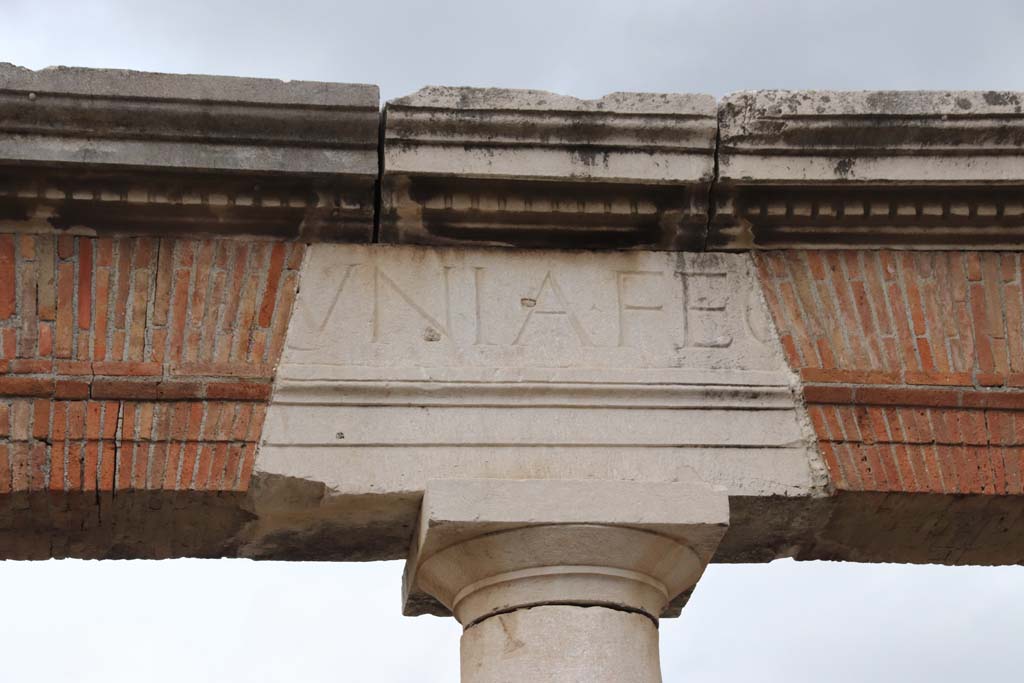 VII.8 Pompeii Forum. October 2020. Portico of Eumachia’s Building, part of inscription. Photo courtesy of Klaus Heese. 
