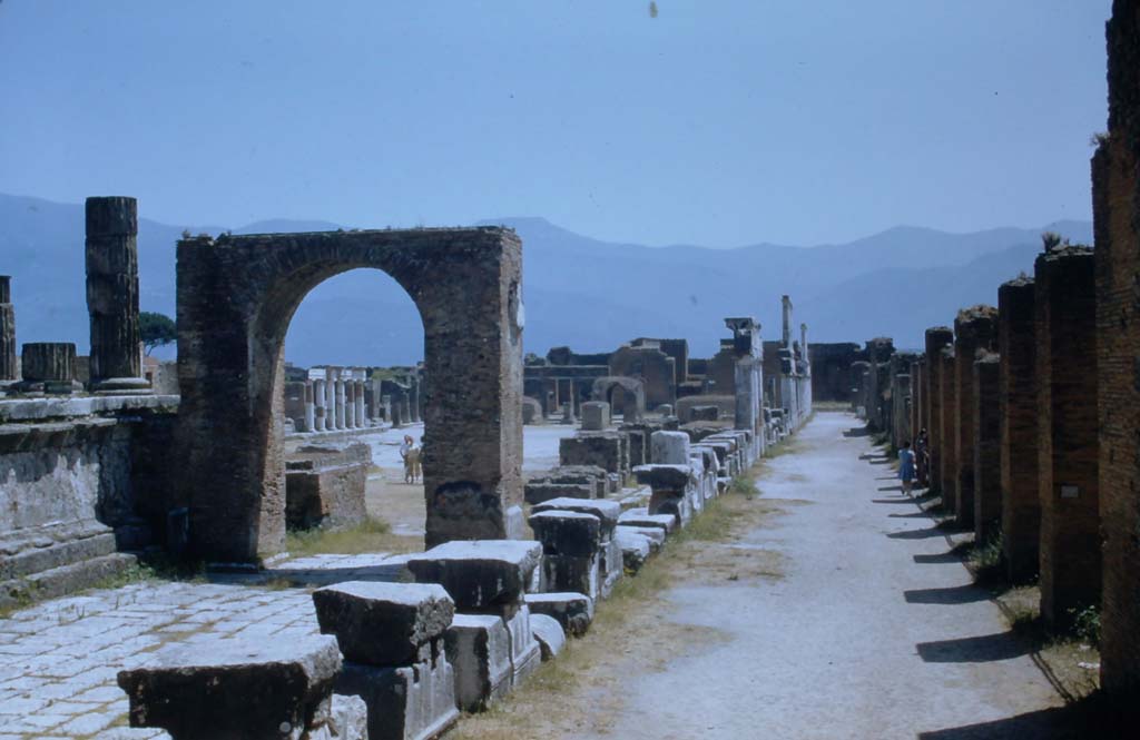 VII.8 Pompeii Forum. 1943 photograph. Looking north along the west side towards the Temple of Jupiter. Photo courtesy of Rick Bauer.