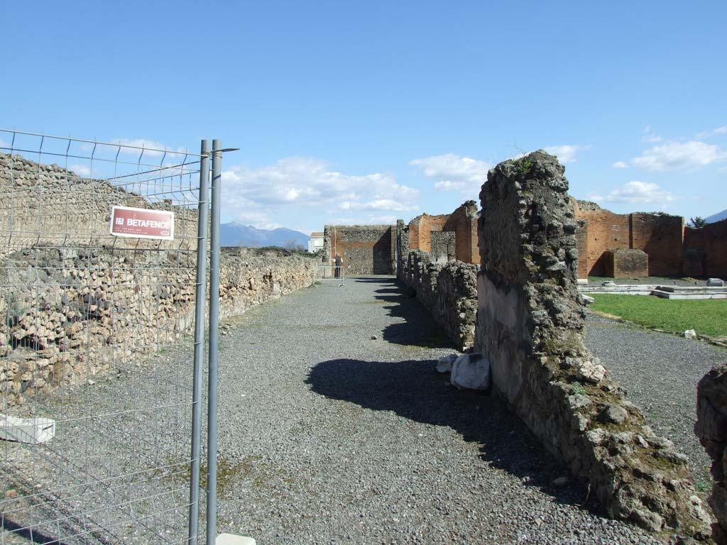 VII.9.1 Pompeii. March 2009. Looking east along outer north corridor 12.