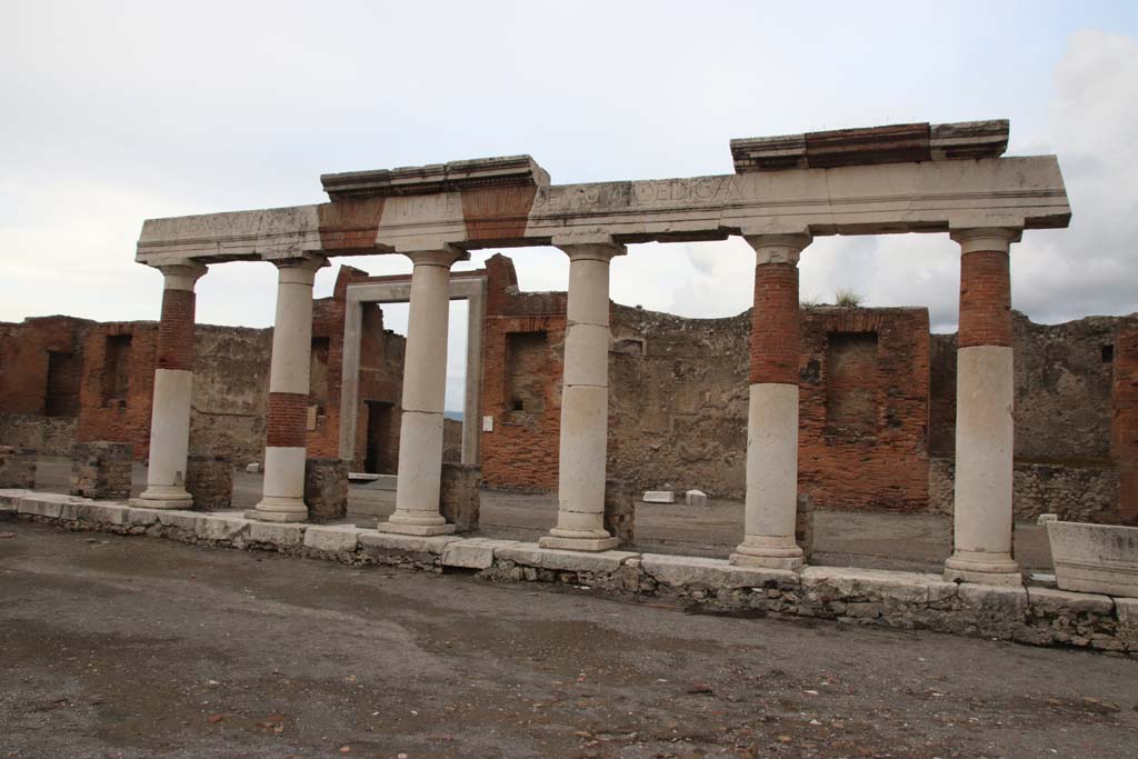VII.9.1 Pompeii, October 2020. Looking east across Forum towards Eumachia’s portico, and entrance doorway.
Photo courtesy of Klaus Heese.
