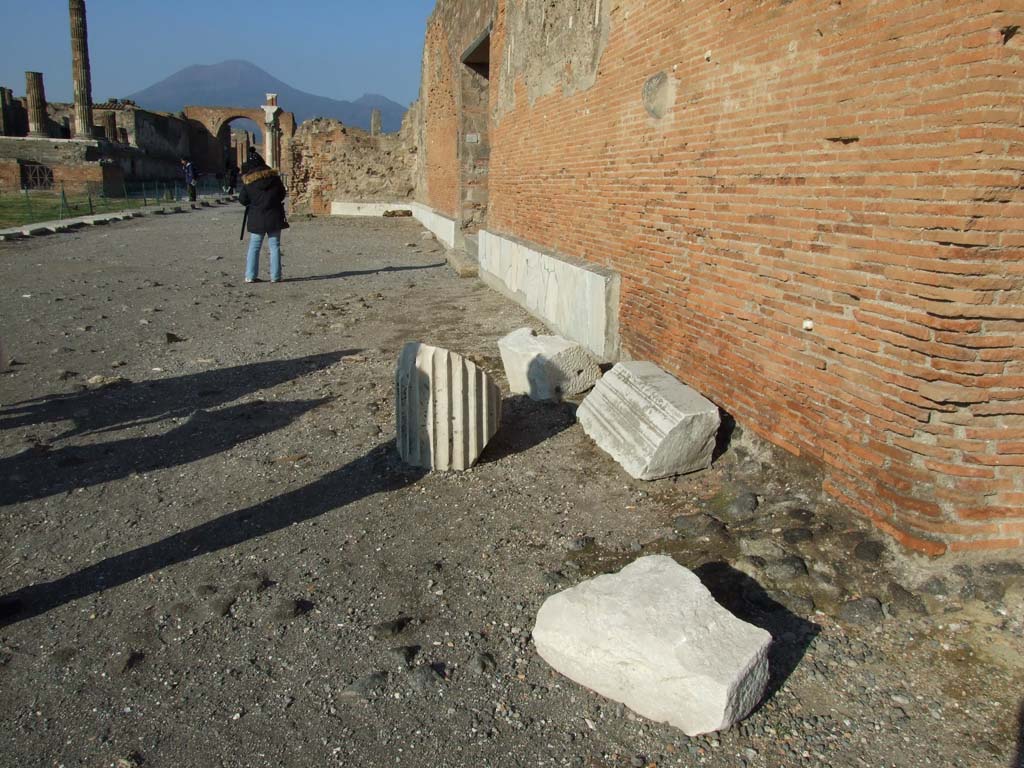VII.9.2 Pompeii. December 2007. Front west wall with marble veneer, facing onto east side of the Forum.