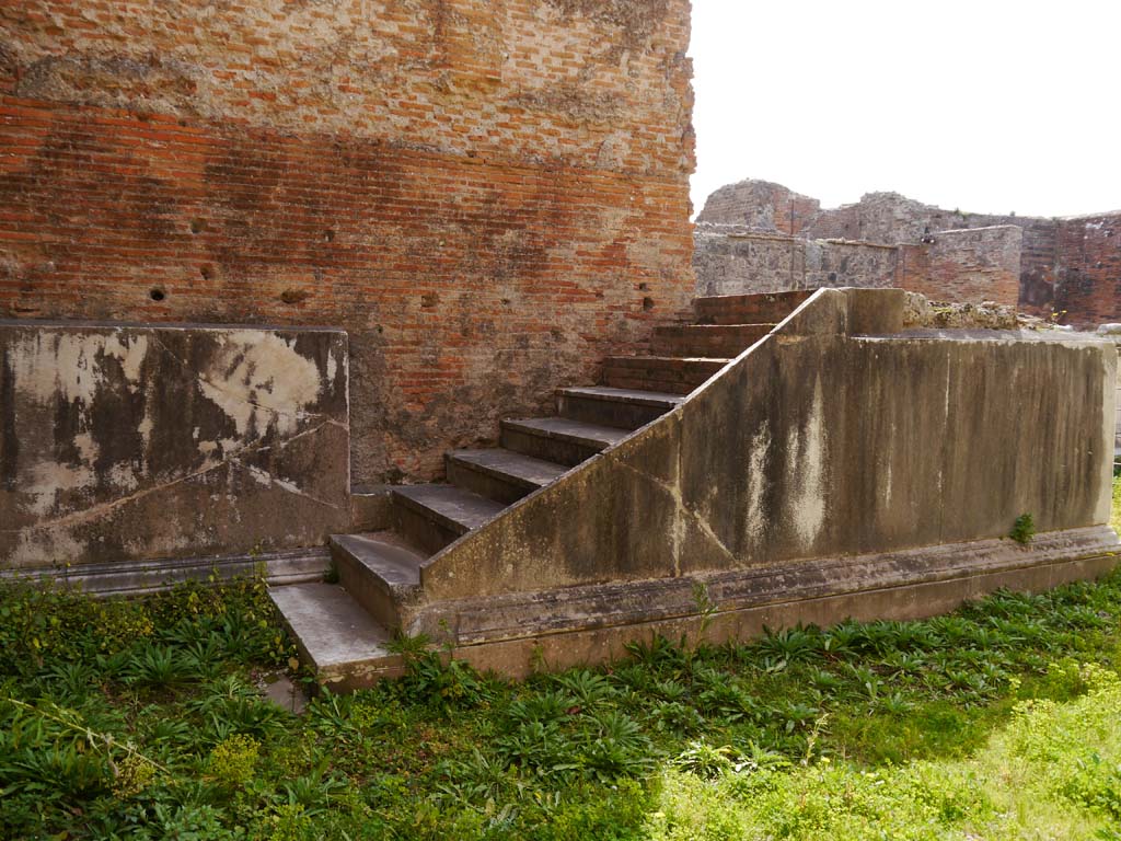 VII.9.2 Pompeii. March 2019. Steps at north end of podium to cella.
Foto Anne Kleineberg, ERC Grant 681269 DÉCOR.
