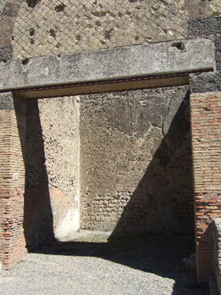 VII.9.10 Pompeii. September 2005. Entrance doorway, looking east.