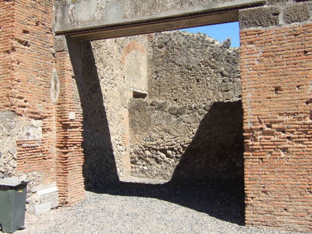 VII.9.12 Pompeii. September 2005. Entrance doorway and north wall. Looking towards north-east corner.