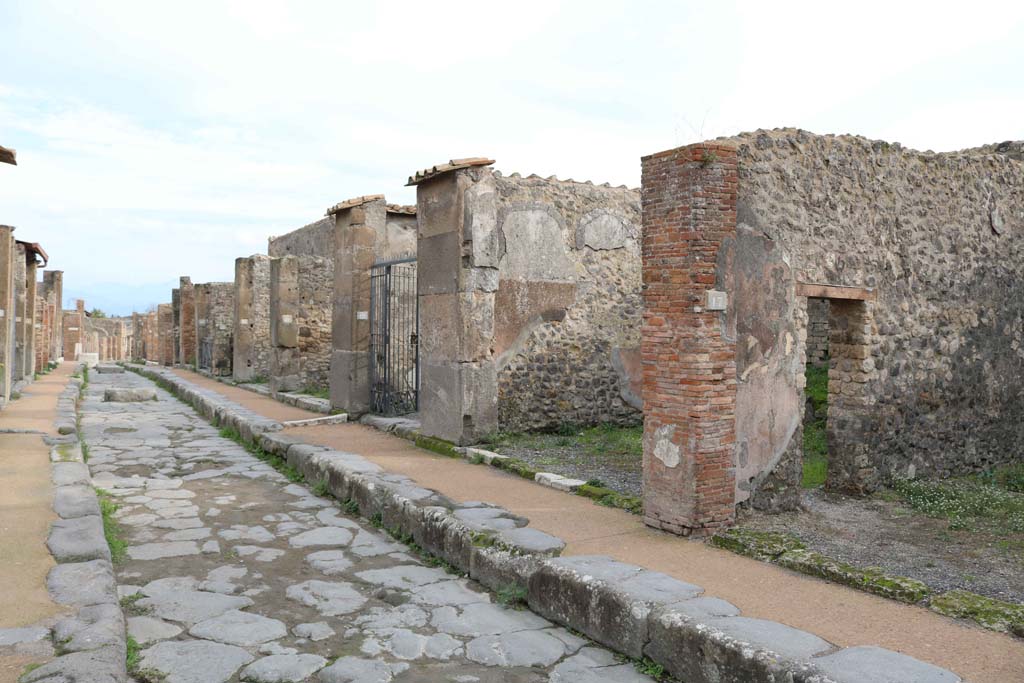 Via degli Augustali, Pompeii, south side. December 2018. 
Looking east from VII.9.17, linked to VII.9.18, on right. Photo courtesy of Aude Durand.

