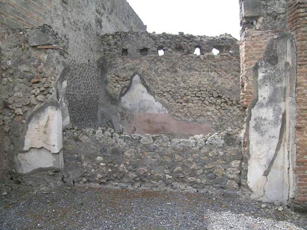 VII.9.26 Pompeii. September 2005. Looking across VII.9.27 towards west wall of shop-room, behind small wall.
Photo courtesy of Nicolas Monteix.
