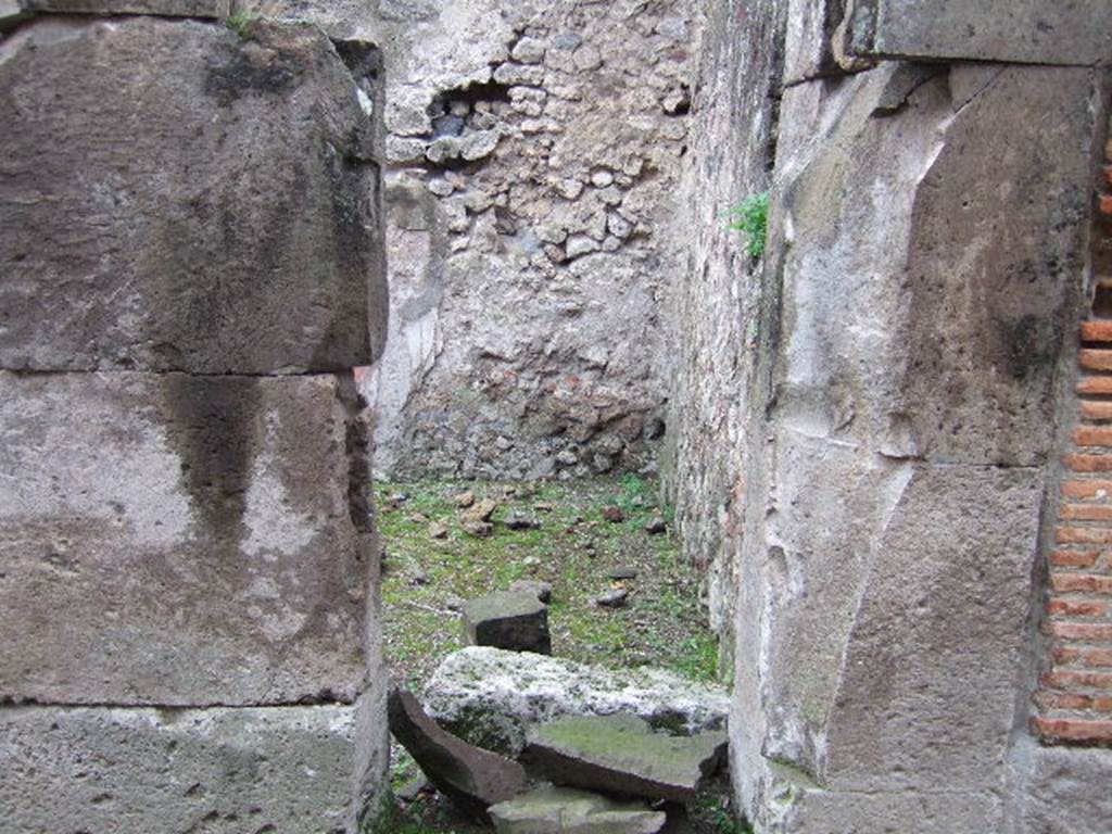 VII.9.45 Pompeii. December 2005. Entrance doorway of separate steps to upper floor, looking south.