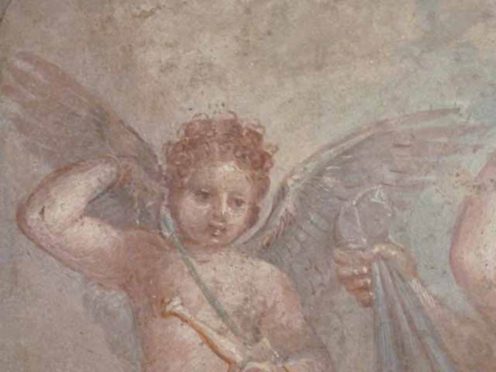 VII.9.47 Pompeii.  Room 6, west wall of tablinum.  Detail showing one of the cupids playing with the sword of Mars. Now in Naples Archaeological Museum. Inventory number: 9248. 
