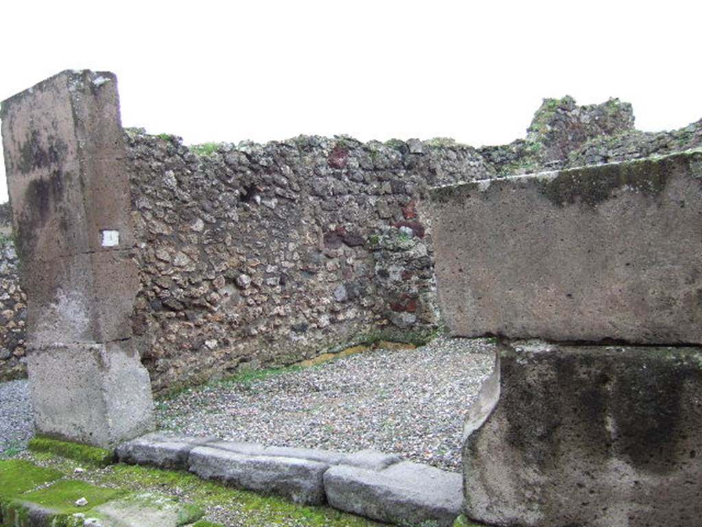 VII.9.50 Pompeii.  December 2005. Entrance and east wall of shop.