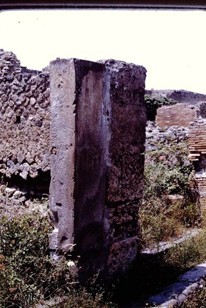 VII.9.56 Pompeii, on right. 1964. 
Looking towards dividing pilaster between VII.9.57, on left, and VII.9.56, on right.
 Photo by Stanley A. Jashemski.
Source: The Wilhelmina and Stanley A. Jashemski archive in the University of Maryland Library, Special Collections (See collection page) and made available under the Creative Commons Attribution-Non Commercial License v.4. See Licence and use details.
J64f1816  
