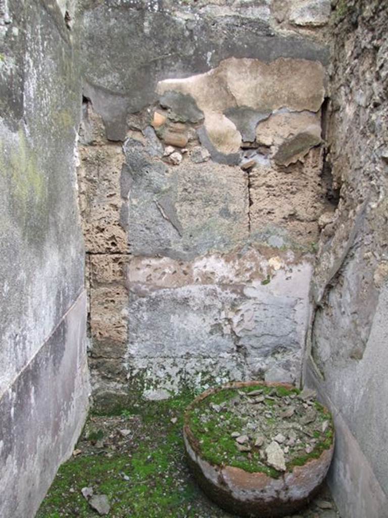 VII.10.9 Pompeii.  March 2009. Small room or storeroom on west side of corridor. West wall.