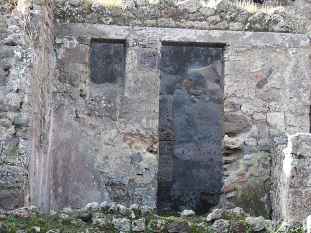 VII.10.12 Pompeii. December 2007. Doorway in west wall at rear, leading to corridor linking VII.10.12 to VII.10.9.