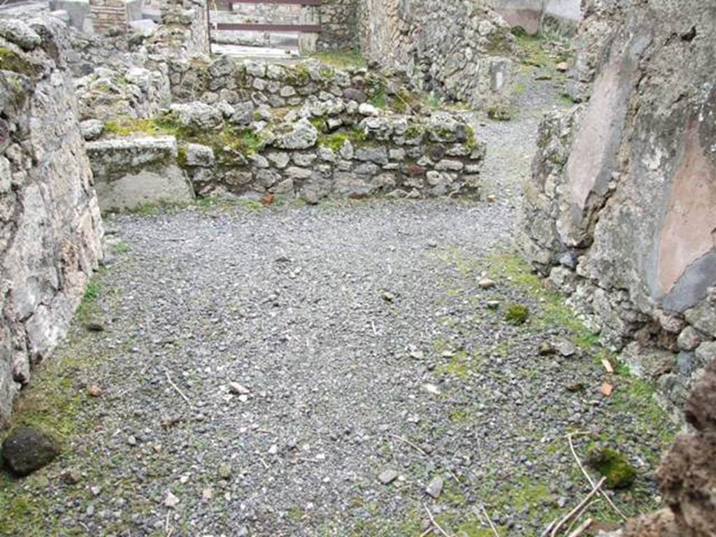 VII.10.12 Pompeii. March 2009. Looking east towards remains of a cubiculum, and the front of the shop.