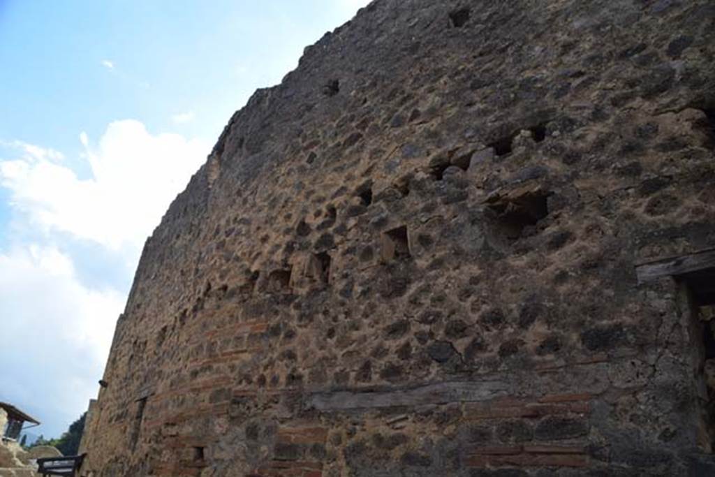 VII.11.13 Pompeii, on left, and VII.11.12, on right. November 2016. Upper exterior wall. 
Photo courtesy of Marie Schulze.
