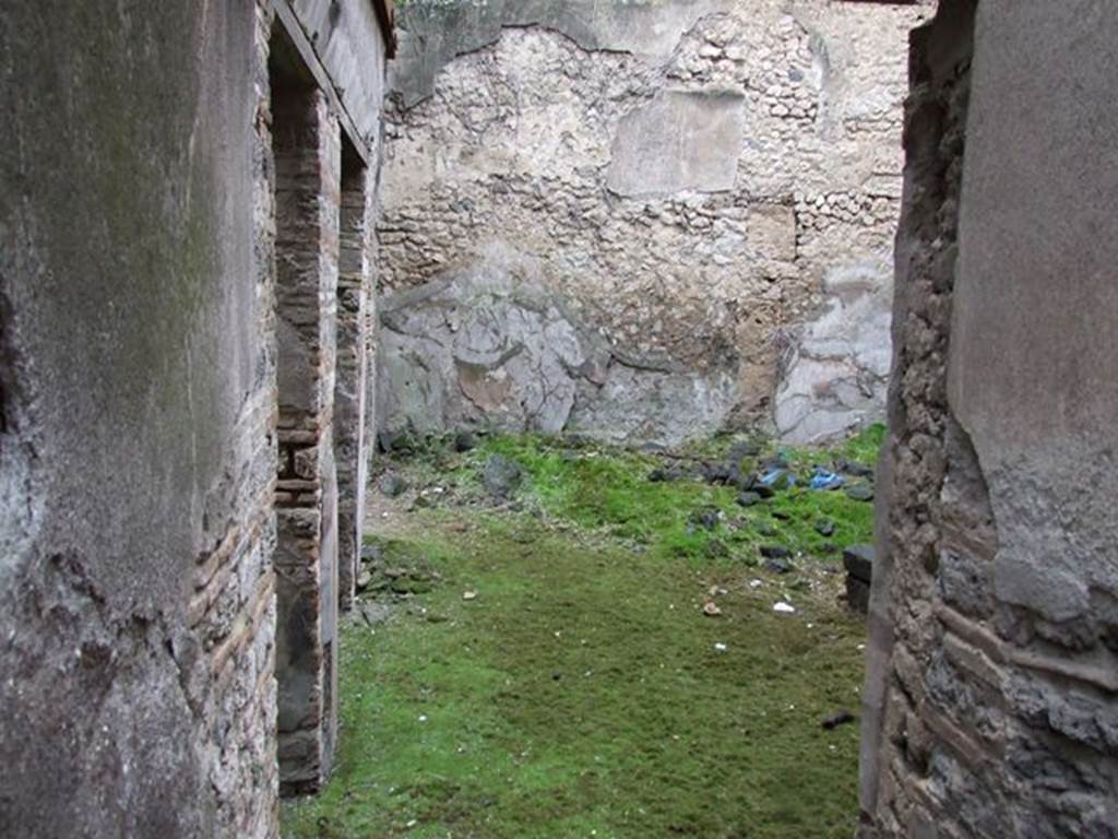 VII.11.11 Pompeii. December 2006. Looking west across south side of atrium from VII.11.12.