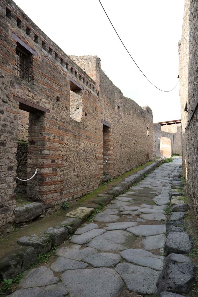  
VII.12.17 Pompeii, on left. December 2018. 
Looking north along west side of Vicolo del Lupanare. Photo courtesy of Aude Durand.


