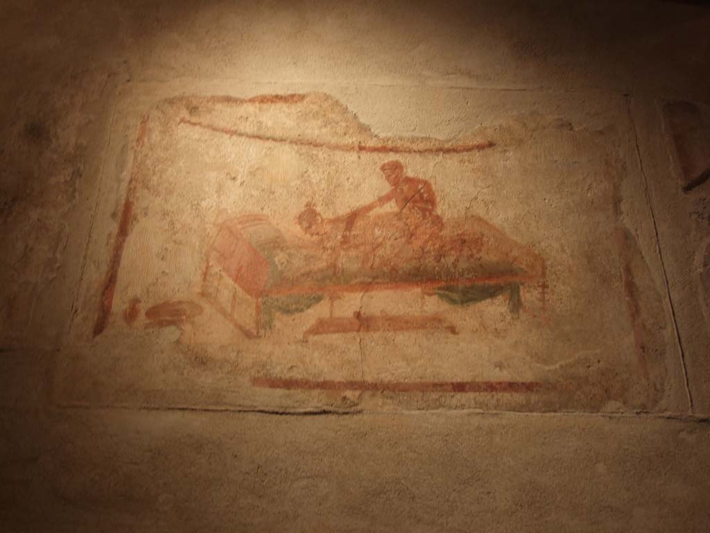 VII.12.18 Pompeii. December 2018. Erotic wall painting on frieze. Photo courtesy of Aude Durand. 