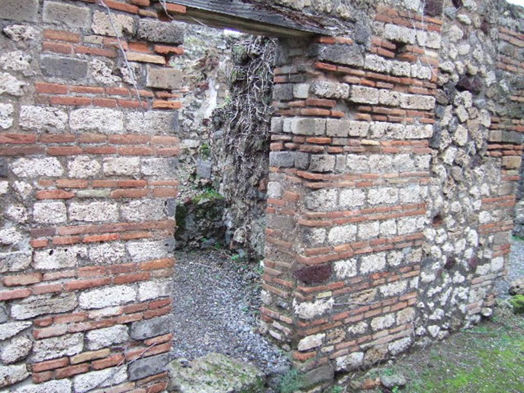 VII.12.33 Pompeii. December 2005. Entrance doorway looking north-east.