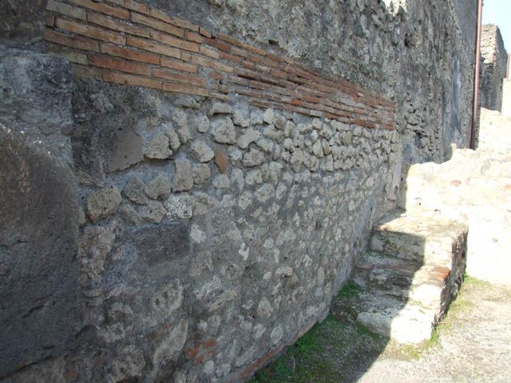 VII.13.6 Pompeii. December 2007. West wall with steps in north-west corner.