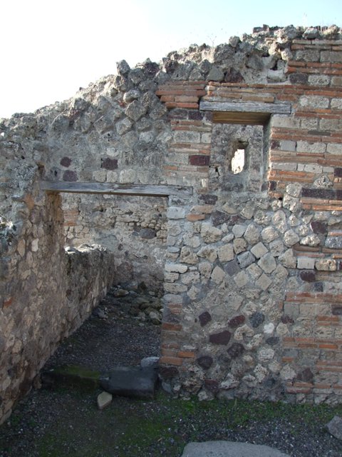 VII.13.7 Pompeii. December 2007. Looking west towards north-west corner of the dwelling.