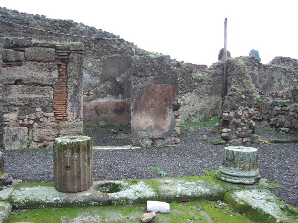 VII.13.8 Pompeii.  December 2005. East side of atrium, with doorway to two Cubicula. 