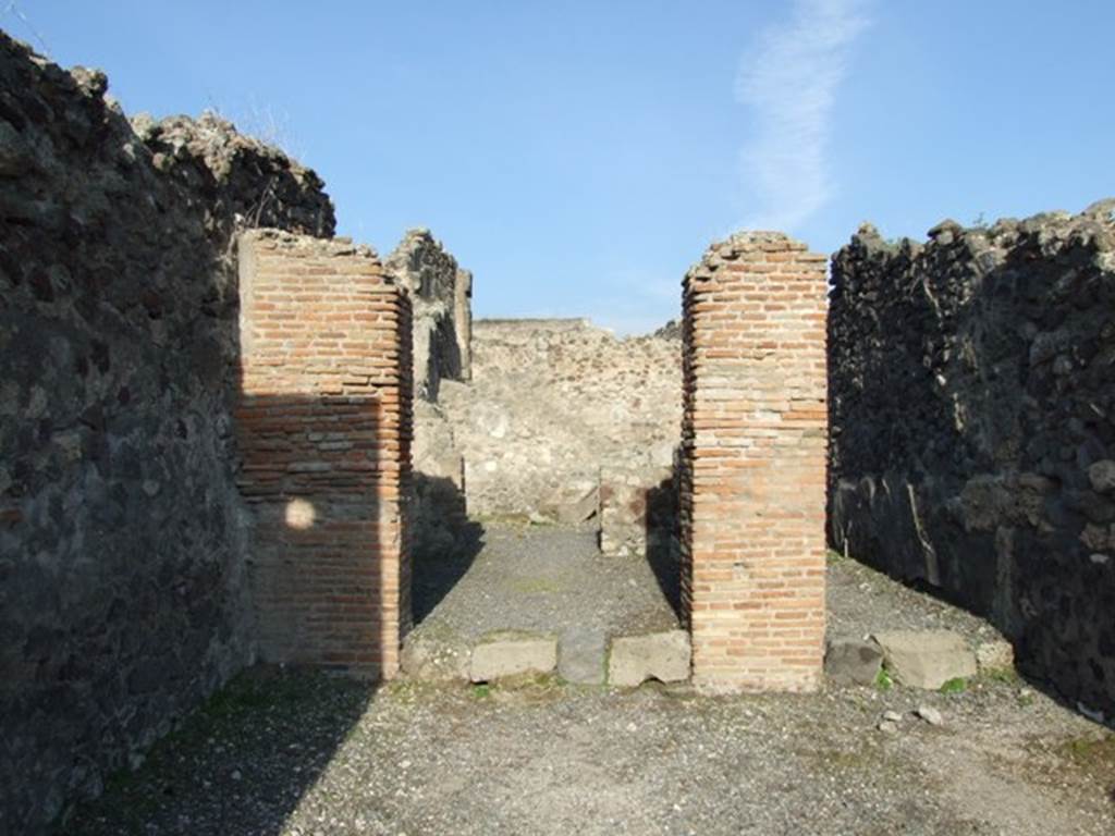 VII.13.9 Pompeii. December 2007. Looking north across shop to two rear rooms and corridor.