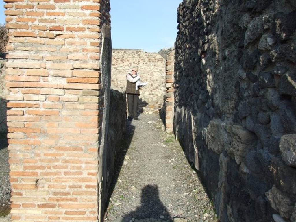 VII.13.9 Pompeii. December 2007. Looking north along corridor to kitchen area.
