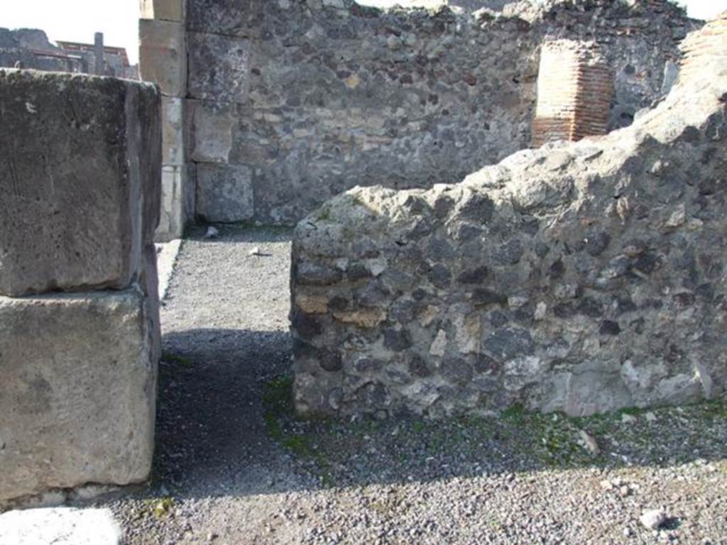 VII.13.10 Pompeii. December 2007. West wall of shop, looking into VII.13.9.