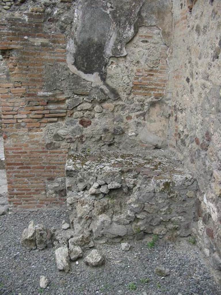 VII.13.20 Pompeii. May 2003. Another hearth or oven on the north side of doorway. 
Photo courtesy of Nicolas Monteix.
